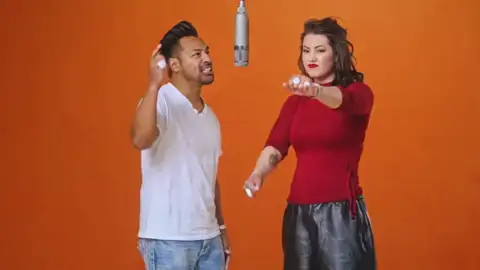 Hotel Lobby AI video of two friends rapping in the orange booth